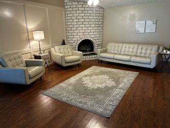 White leather couch and chairs