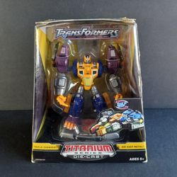 Hasbro Titanium Series Transformers
Optimal Optimus Cybertron Heroes Diecast Action Figure 2006 NIB