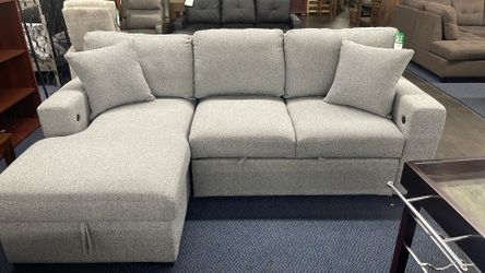 Sectional With Pull Out Bed And Storage Chaise 