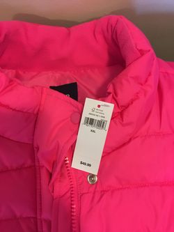 Women’s pink vest.