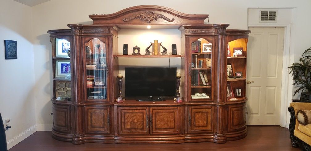 Elegant Versatile Entertainment Center With Thick Glass Shelving, Lighting Throughout And Removable Ends That Can Be Set Apart In Corners