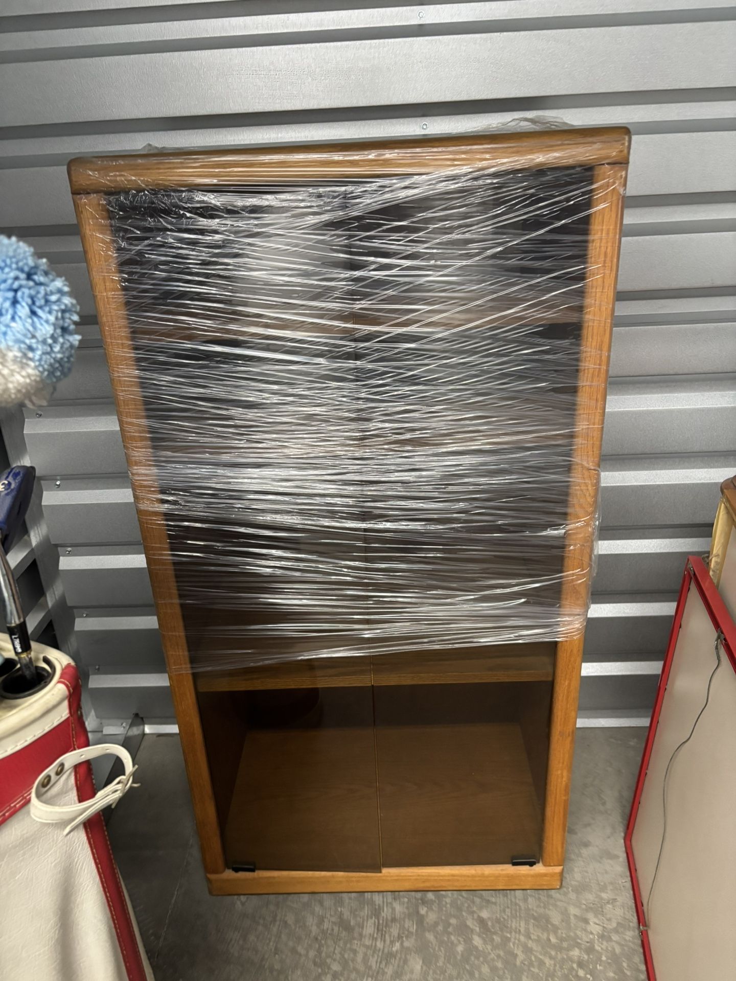 Oak Cabinet With Smoked Glass Doors