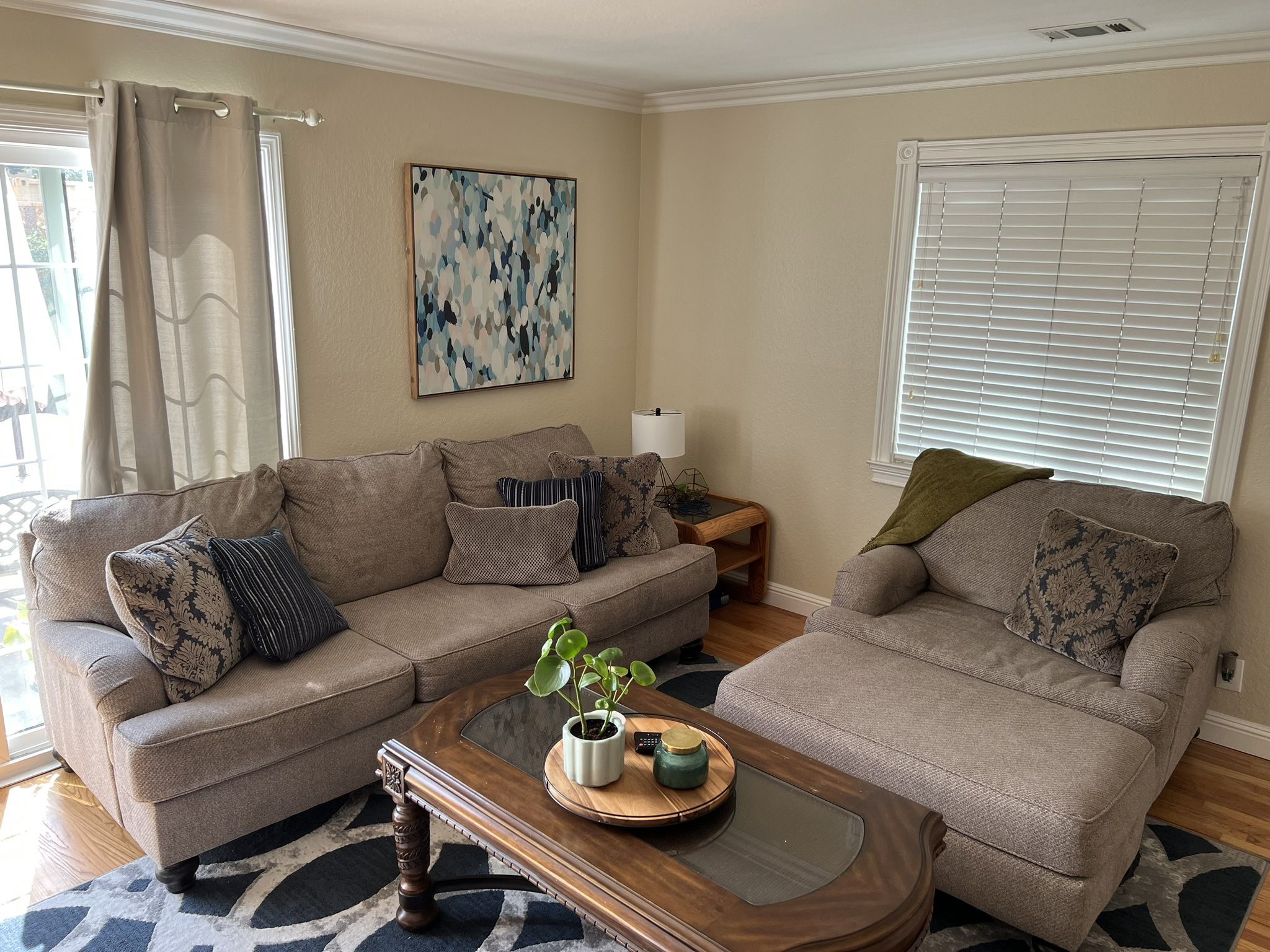 Couch and large chair with ottoman + Coffee Table + Rug