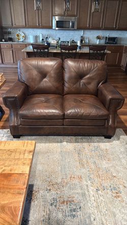 Brown Leather sofa and love seat