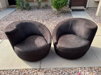 2 Asymmetrical Swivel Chairs