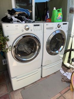 Front load washer and dryer LG excellent shape with pedestals