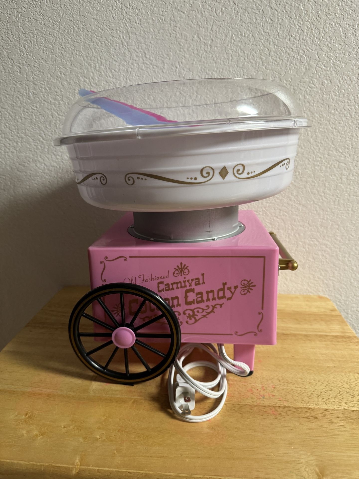 Two Cotton Candy Machines And a Popcorn Machine 