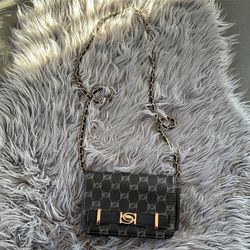 Stylish Black and Gold Bebe Bag