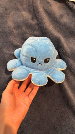 Turquoise and blue stuffed octopus