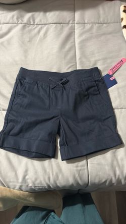Size 6 navy blue shorts and beige pants school uniforms