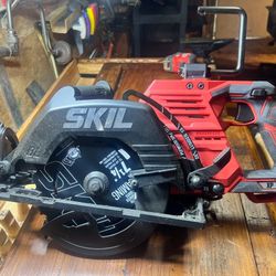 NEW The saw is a SKIL PWRCORE 20xp with a battery charger and 2 20v batteries