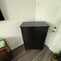Black dresser with five drawers