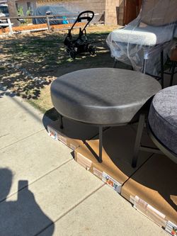 Gray leather ottoman