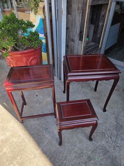 Set of three Asian tables.