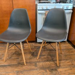 Black plastic chair with wood legs, set of 2