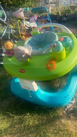 Baby Joy Walker price 25$. Pick up. E.  Tacoma