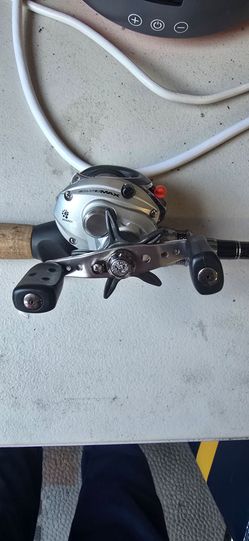 Diana bait casting  rod like new abu Garcia reel shows a few scratches