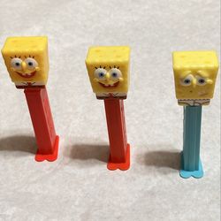 D11 Lot of 3 SpongeBob SquarePants PEZ dispensers, ©2014 Viacom. Includes multiple variations of SpongeBob character heads with different expressions 