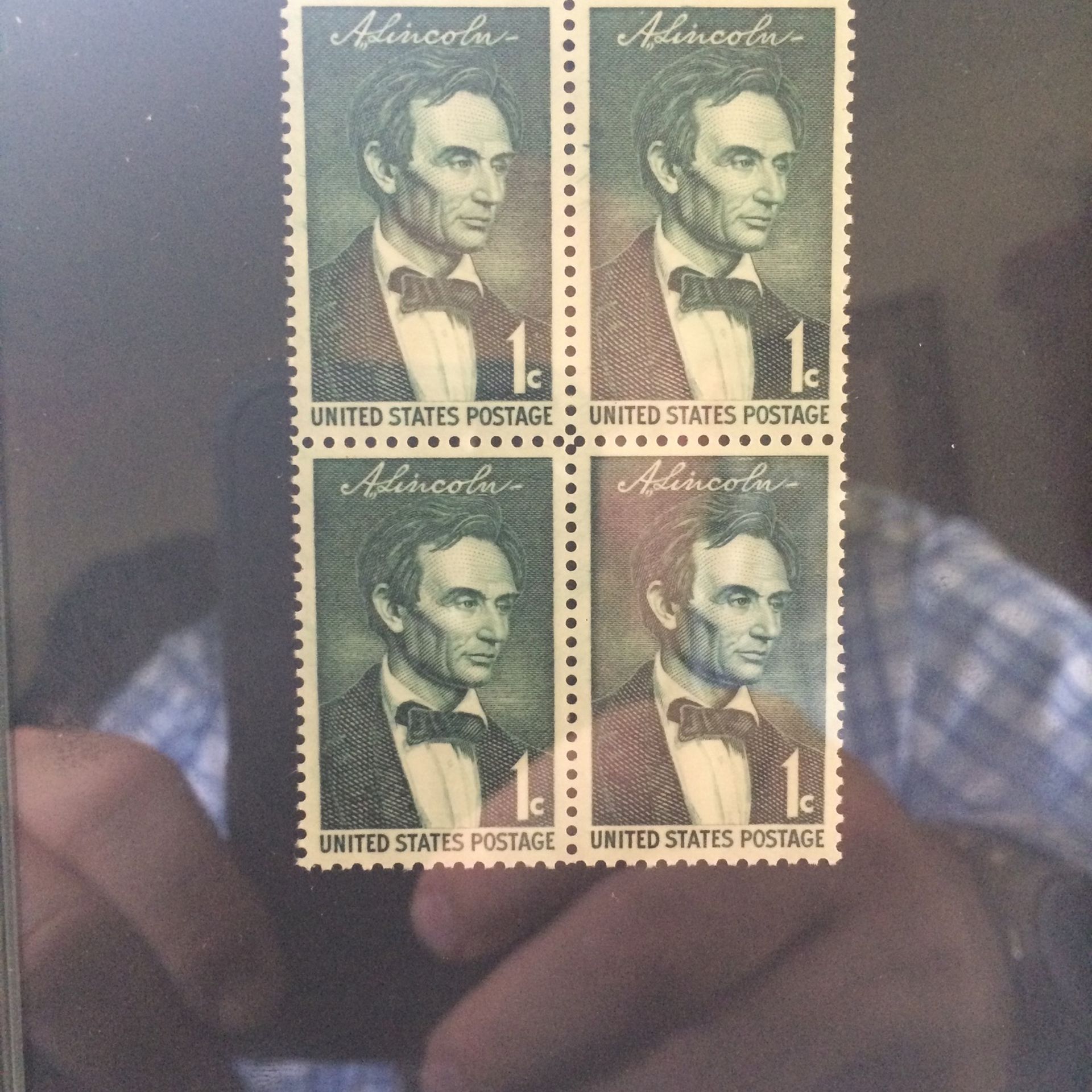 4 Unused Abraham Lincoln one cent stamps