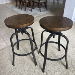 Set of (2) quality bar stools… adjustable wood seats w/ hammered aluminum frames