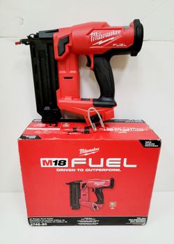 Milwaukee M18 FUEL 18 gauge brad nailer is red and black. This cordless tool has a belt hook and comes with its original box. It is a tool-only model 