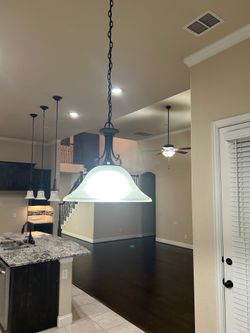 Bronze traditional chandelier hang in casual dining