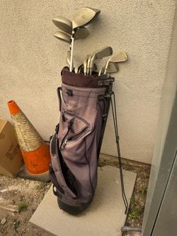 Used golf clubs and golf bag