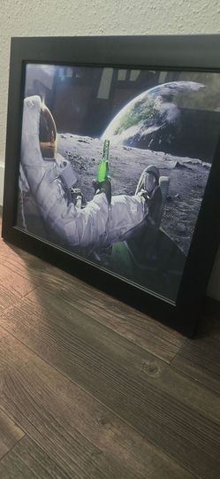 Astronaut Relaxing On The Moon Framed