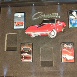 Special Edition Chevy Corvette Zippo Lighter Collection With 4 Lighters And Special Glass Case.