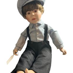 Doll  beautiful Porcelain Amish little Boy doll in in Gift quality Pre-owned excellent condition. No original box. T-195