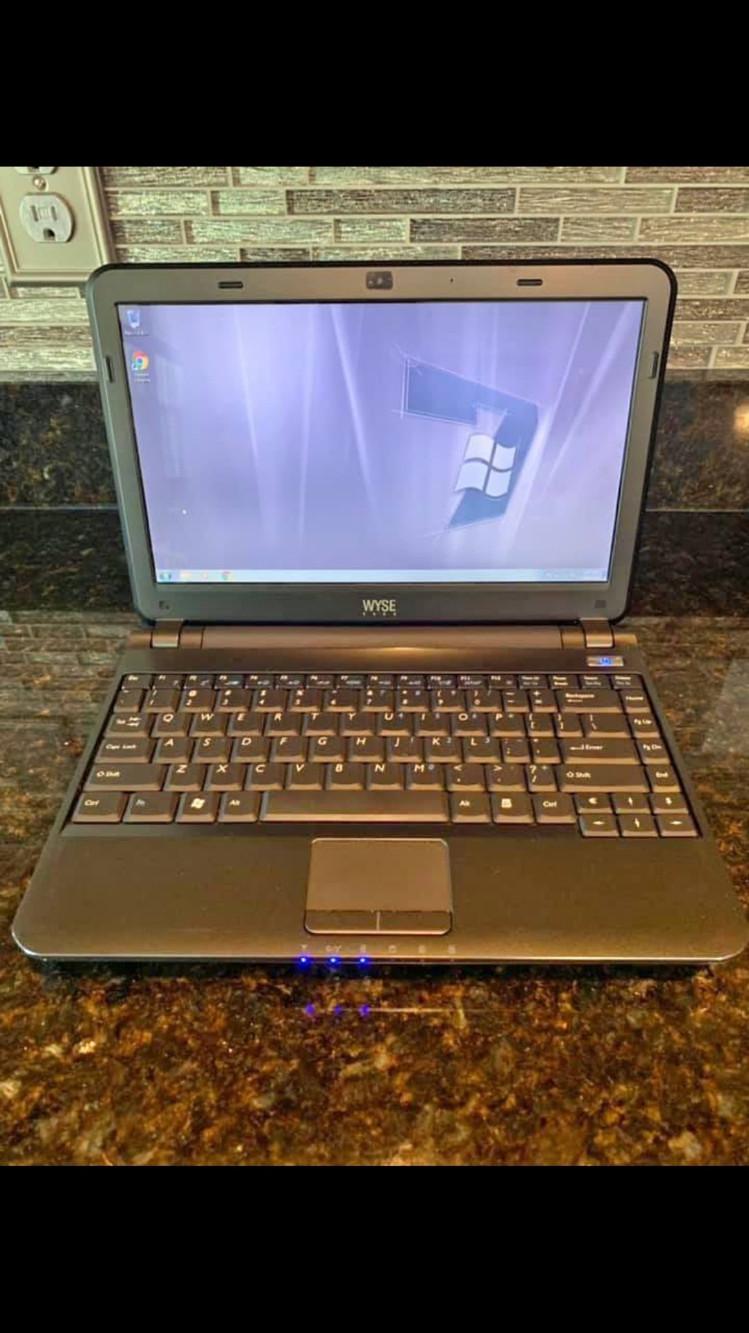 11”Dell WYSE Xxoc Mini Laptop with Webcam, Windows 7 and Microsoft Office.