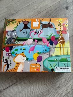 Janod "A Day at the Zoo" 20-piece tactile puzzle intended for ages 3-6.