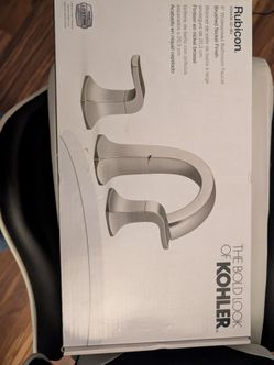 Kohler nickel sink. Two faucet openings