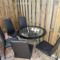 Table and 4 chairs leather for sale