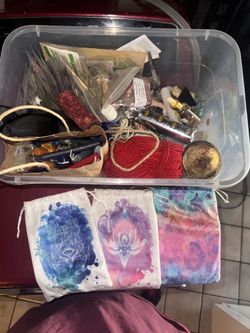 Tarot cards, oracle cards and box of herbs crystals and candles