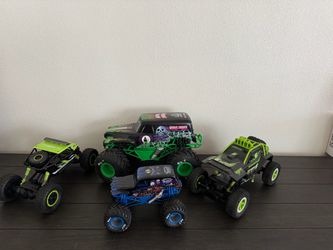 Lot of 4 RC Monster Trucks