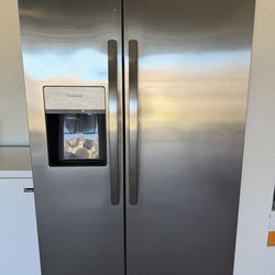 Frigidaire stainless steel refrigerator with ice maker and water