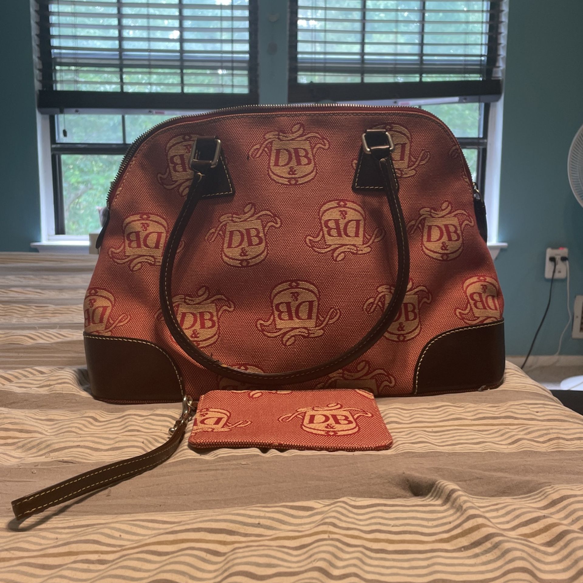 Dooney & Bourke Hand Bag With Wristlet And Keychain Used Once