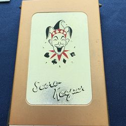 vintage "Score Keeper" is a copper-toned metal flip case