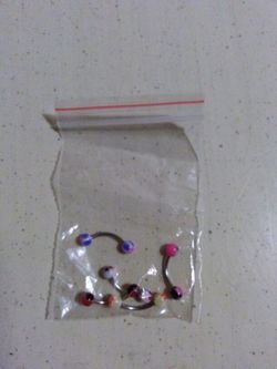 5 assorted multi-colored piercing rings