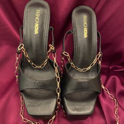 Gold ankle chain, black heels