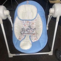 foldable portable electric baby swing .batteries or usb cable adapter. super good clean condition has music and vibration.. sells on Amazon for 79$ pl