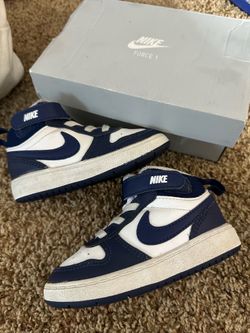Blue and white air Jordan’s Velcro strap