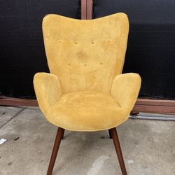 Mustard yellow wingback accent chair