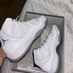 white and baby blue jordan 11s size 7Y 