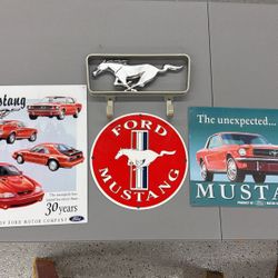 Metal Mustang signs 