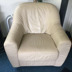 Leather swirl living room chair.