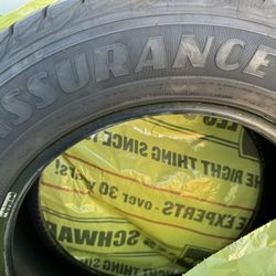 Two Goodyear Assurance WeatherReady tires (225/65R17 102H)