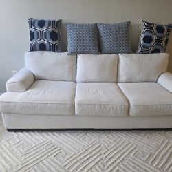 Beige Sofa And Rug Set