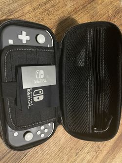 Grey Nintendo Switch Lite  Case & charger